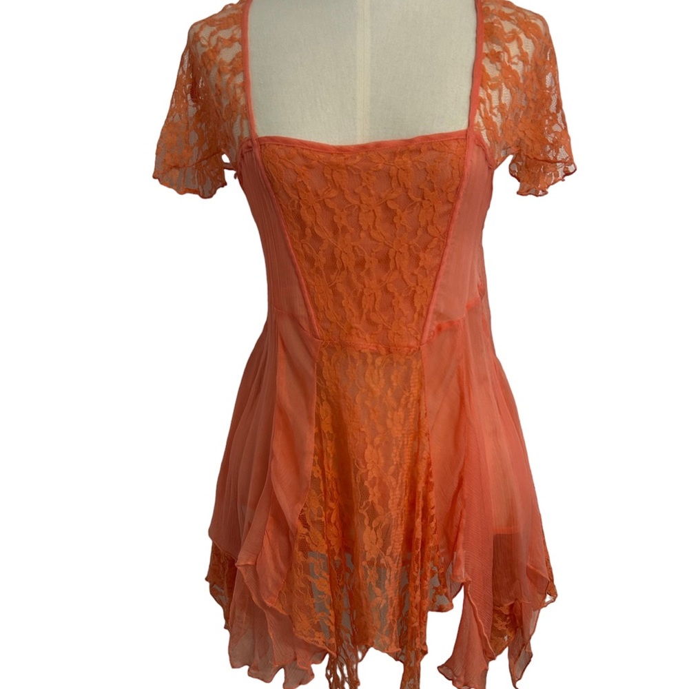 Free People on a whim orange lace top womens‎ size small.